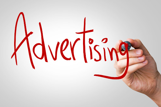 What is advertising and how does it influence people?