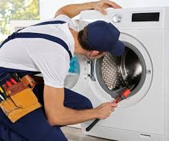 Are there certain models or brands of washing machines that are more prone to needing repairs in the Abu Dhabi climate?