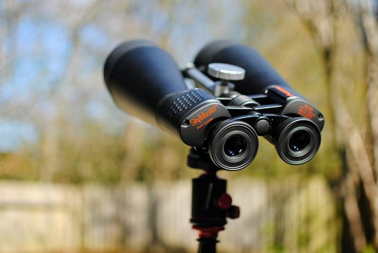Can I use my binoculars with eyeglasses or contact lenses?