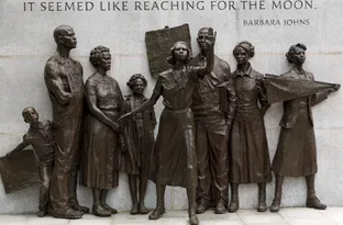 Who Created the Sculpture of Human Rights?